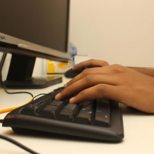 Person using computer for finance